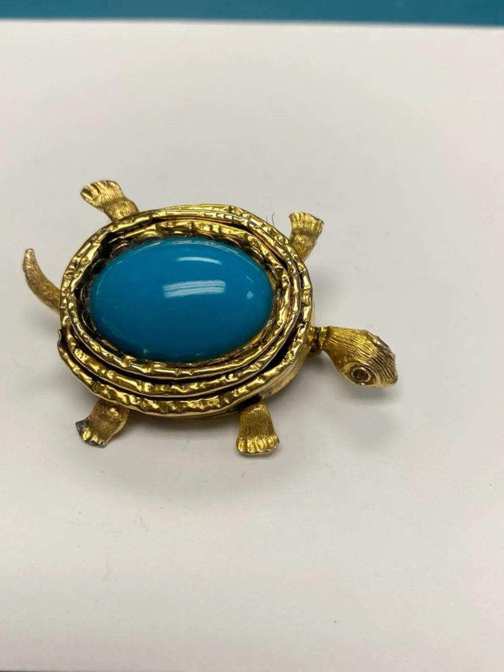 Gold tone Turtle Brooch with Turquoise colored stone